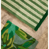 Dutch floral green bath mat by Bonnie and Neil, featuring a long, decorative floral design for bathroom decor.