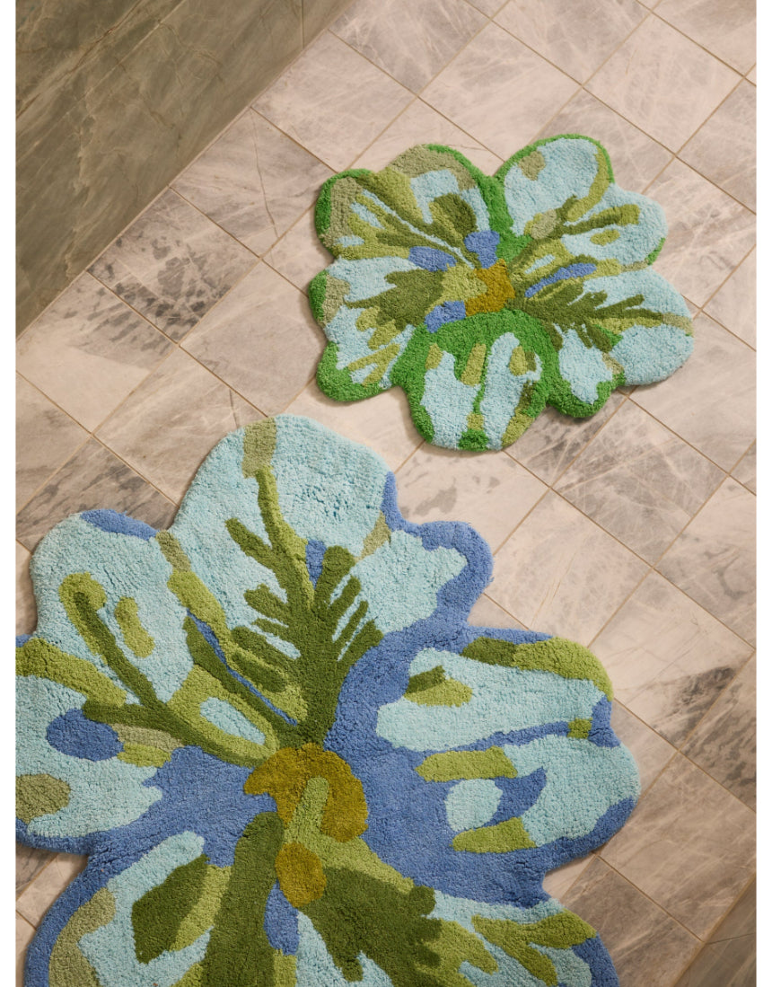 Bonnie and Neil Tulip Blue Green bath mat with floral design, soft fabric, and non-slip backing for bathroom decor.