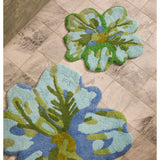 Bonnie and Neil Tulip Blue Green bath mat with floral design, soft fabric, and non-slip backing for bathroom decor.