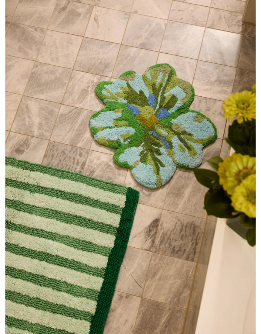 Bonnie and Neil Mini Tulip Blue Green Bath Mat with floral pattern, soft texture, ideal for bathroom decor and comfort.