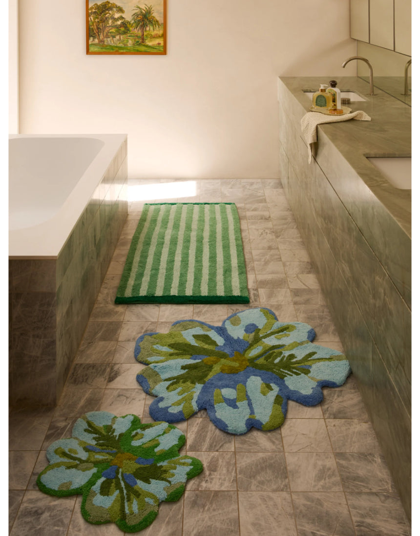 Bonnie and Neil Tulip Blue Green bath mat with floral design, soft texture, and bathroom decor style.