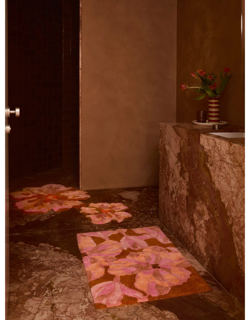 Bonnie and Neil Dutch Floral Pink Bath Mat with tulip and floral design, soft textured rug for bathroom decor.