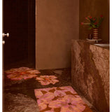 Bonnie and Neil Dutch Floral Pink Bath Mat with tulip and floral design, soft textured rug for bathroom decor.
