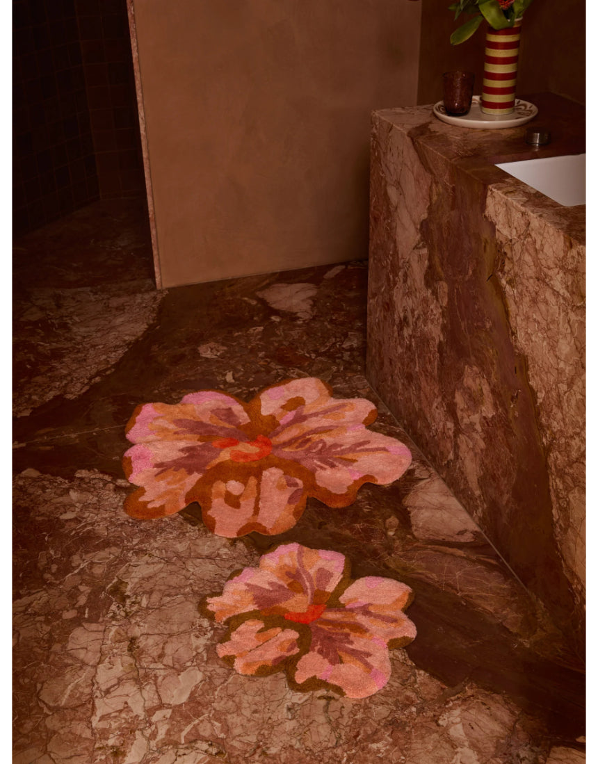 Bonnie and Neil Tulip Tan Bath Mat with soft textured surface, styled in a modern bathroom setting.