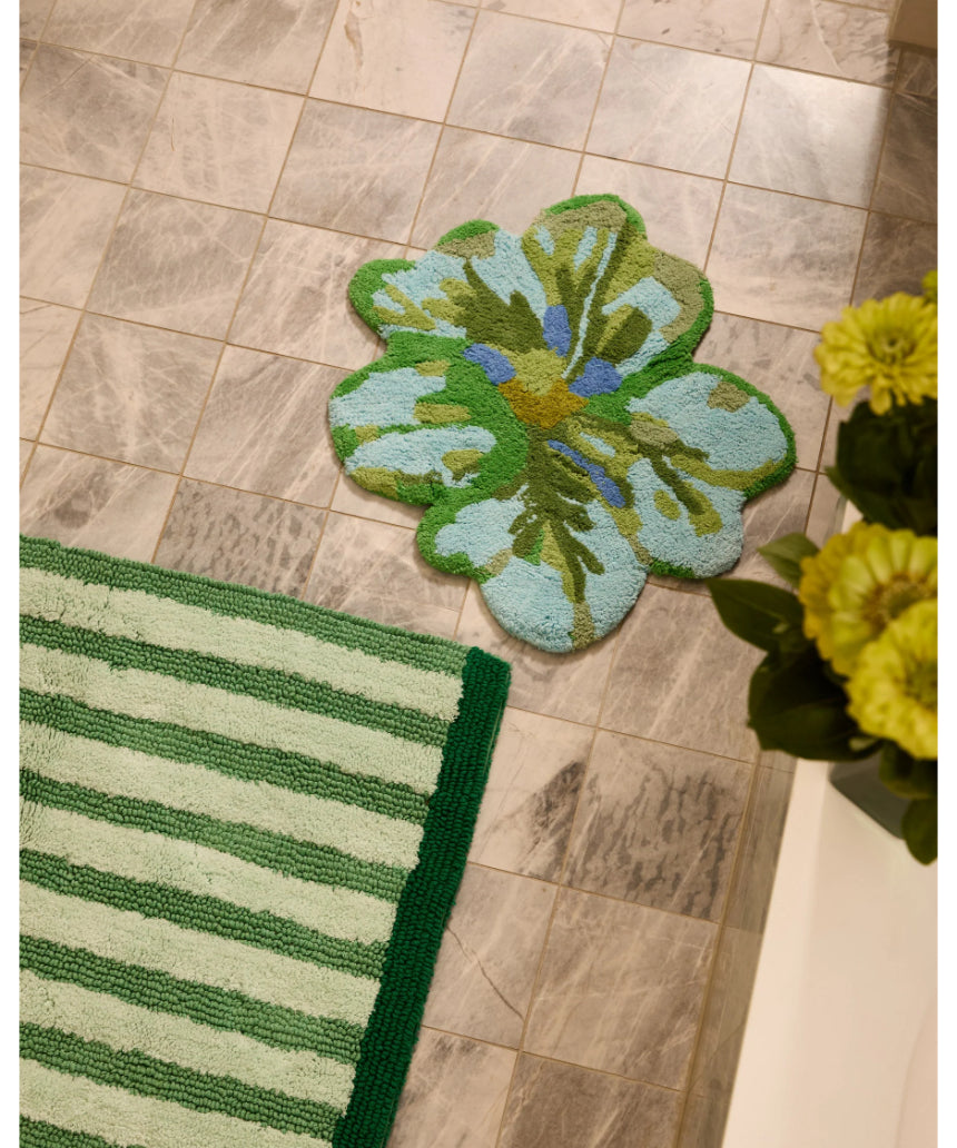 Reversible green stripe bath mat by Bonnie and Neil, featuring soft, absorbent material perfect for bathroom decor.