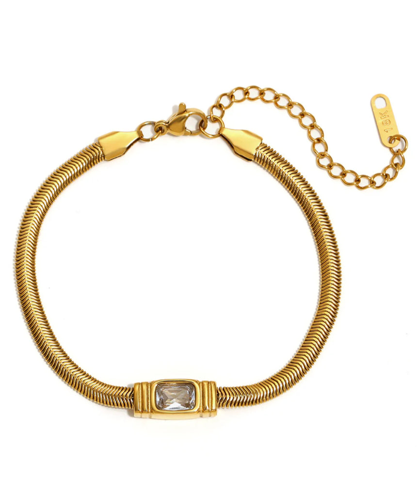 Salty Safari Monaco bracelet featuring gold-tone chain and tropical-inspired charms, stylish accessory for summer wear.