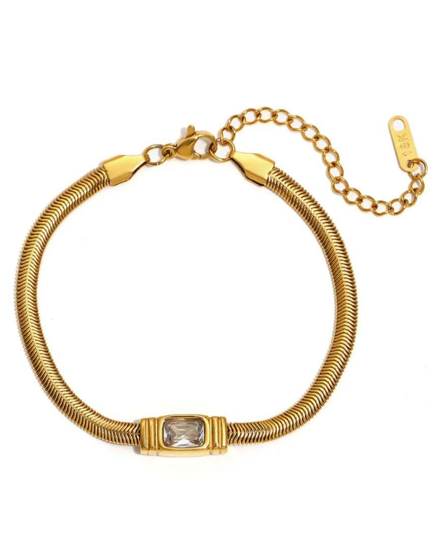 Salty Safari Monaco bracelet featuring gold-tone chain and tropical-inspired charms, stylish accessory for summer wear.