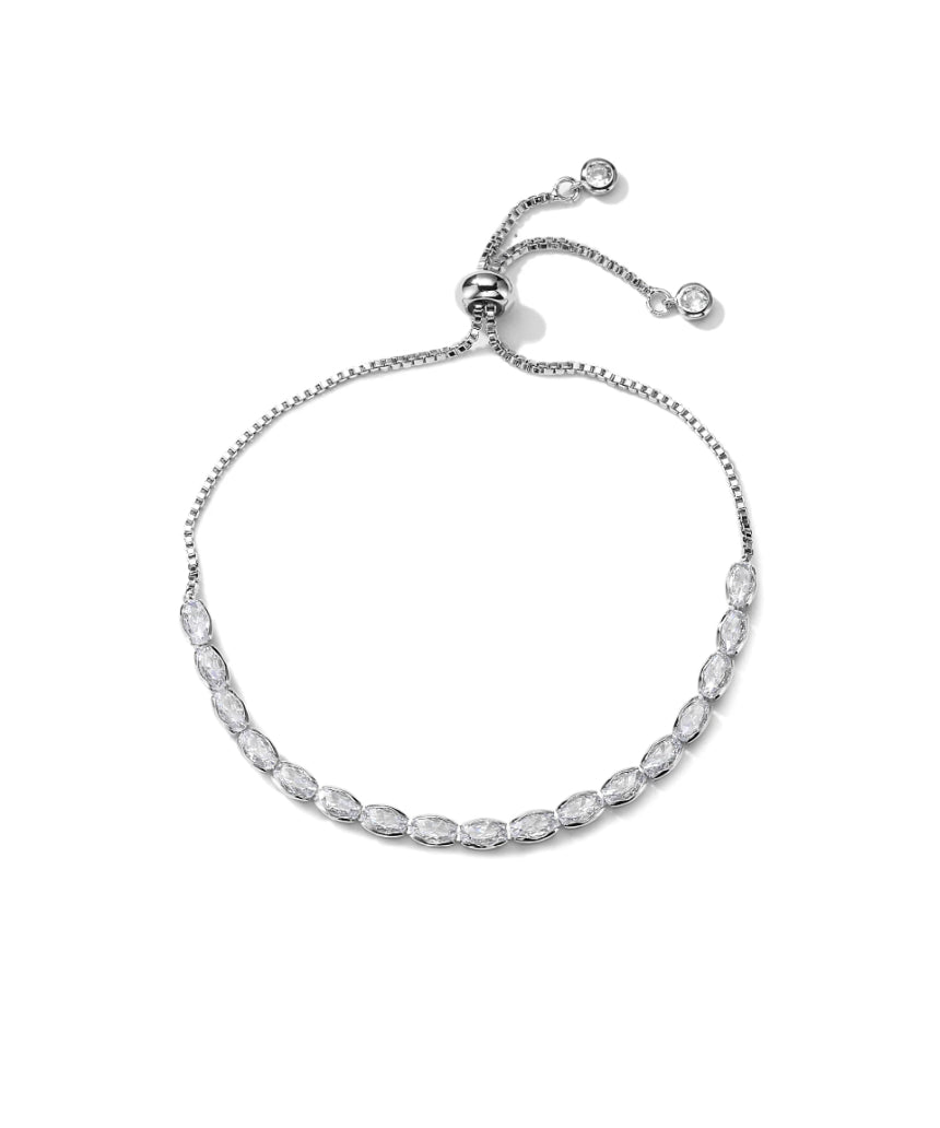 Salty Safari Sia Tennis Bracelet with sparkling stones and gold-tone chain, close-up view of the elegant jewelry piece