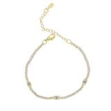 Salty Safari Evil Eye protection tennis bracelet featuring blue and silver beads on a delicate chain.