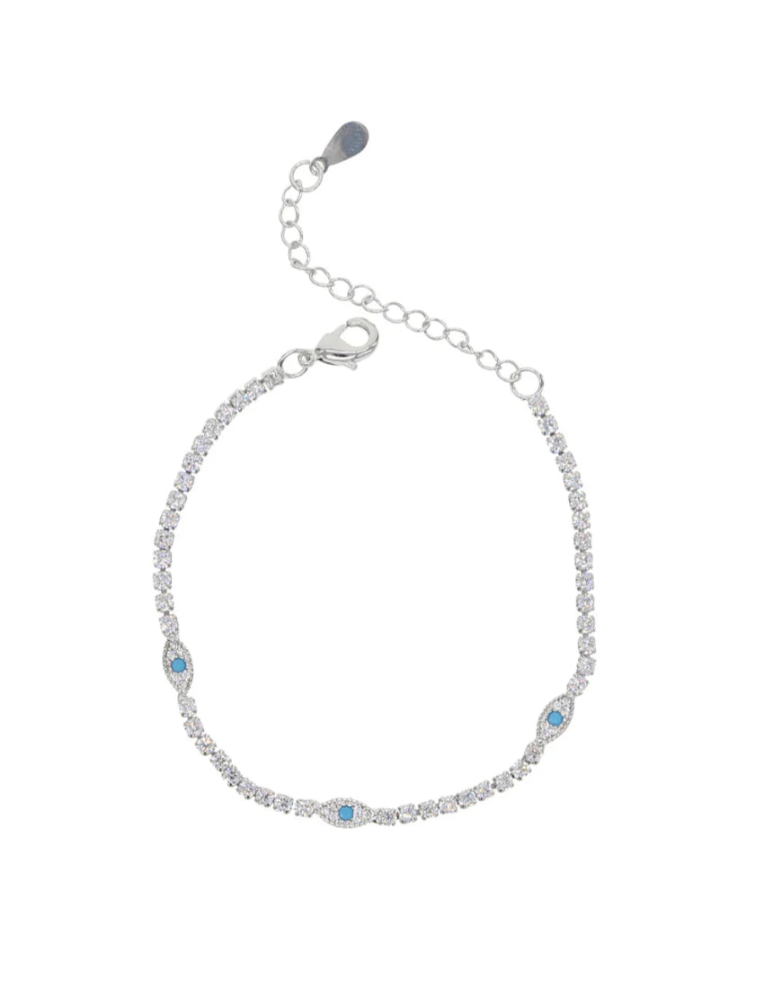 Salty Safari Evil Eye Protection Tennis Bracelet featuring a silver chain with blue and white evil eye charms on a white background.