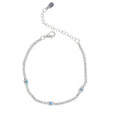 Salty Safari Evil Eye Protection Tennis Bracelet featuring a silver chain with blue and white evil eye charms on a white background.