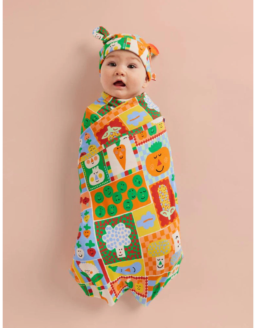 Halcyon Nights pocket patch baby hat with colorful patch design, soft fabric, and snug fit for newborns and infants.