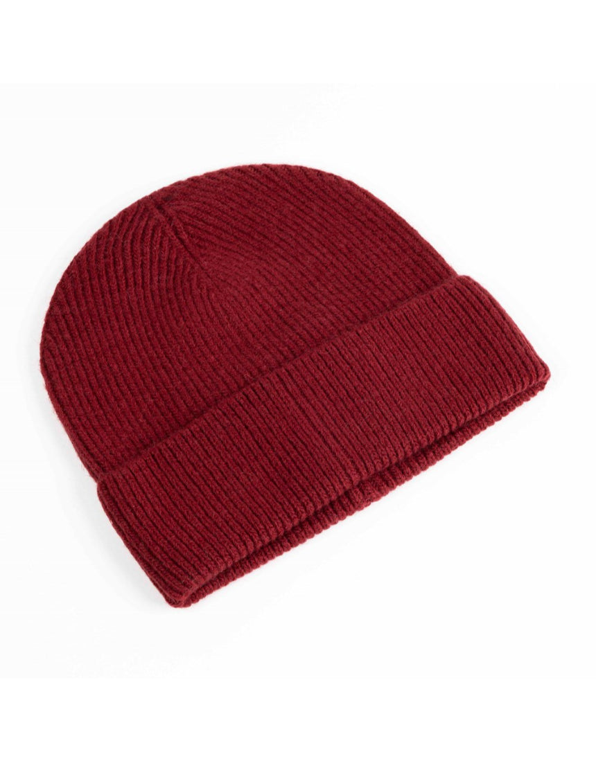 Maison Fanli Auguste Beanie in Bordeaux color, soft knit fabric, shown on a head, stylish winter accessory.