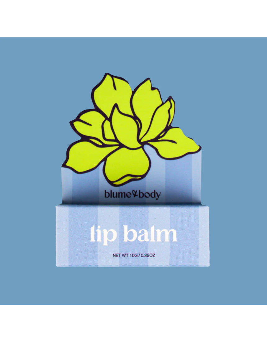 Blue tube of Bloom & Body Mango Lip Balm with a vibrant label, showcasing a moisturizing lip care product.