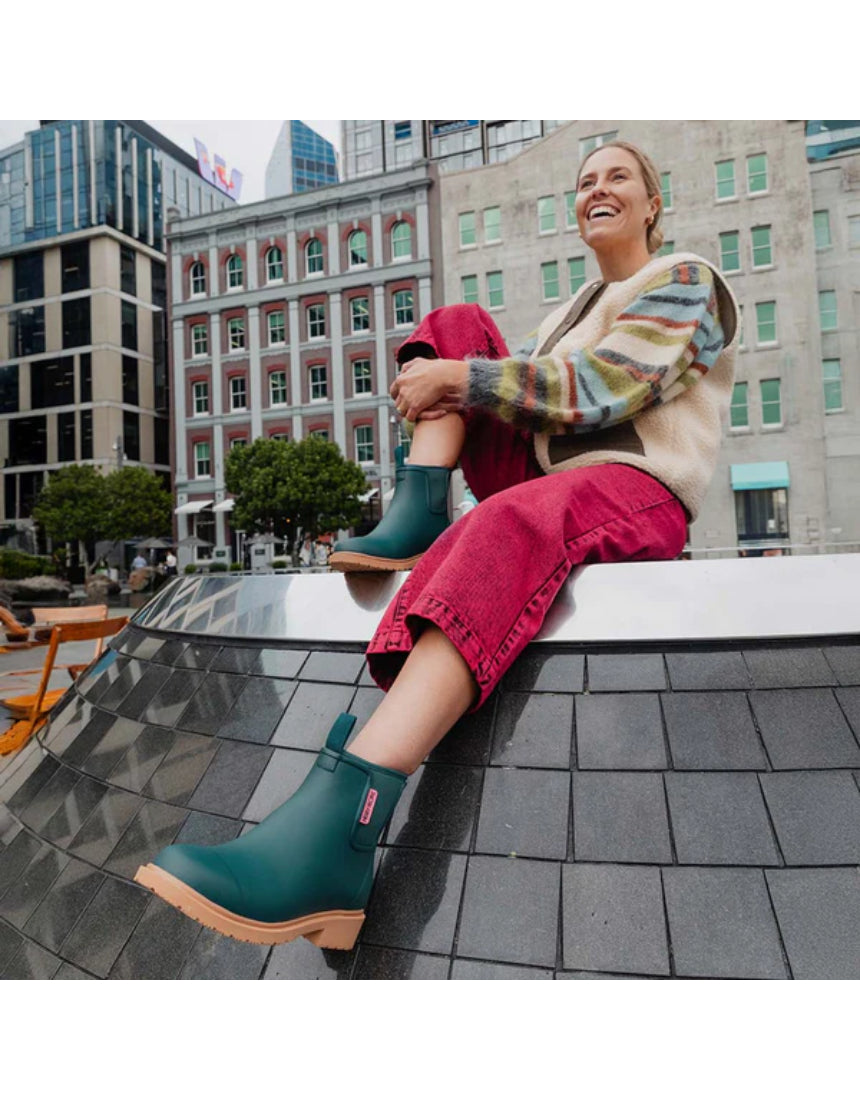Merry People Bobbi Gumboots in teal, showcasing waterproof rubber footwear with a stylish, vibrant design.