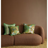 Bonnie and Neil Wild Pansy Verde 50cm linen cushion with floral design, perfect for living room decor.