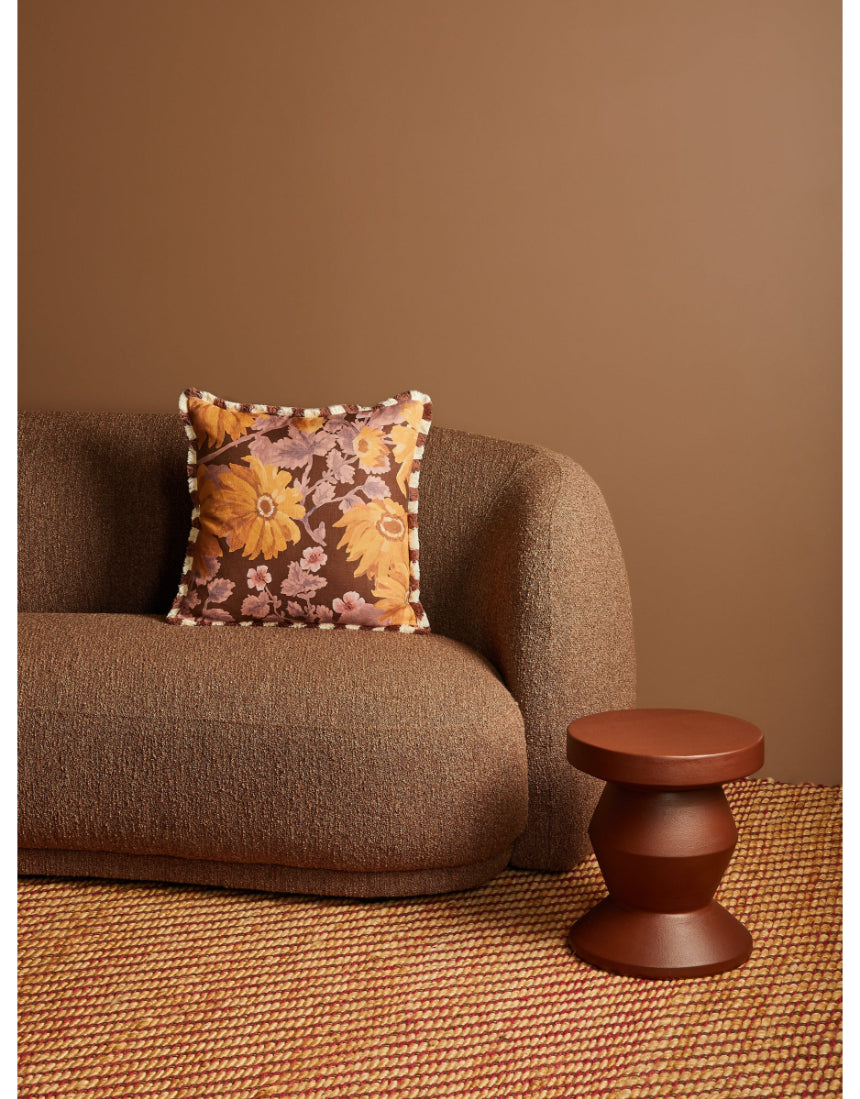 Bonnie and Neil Marigold Amber 50cm linen cushion with textured fabric, perfect for living room decor.