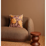 Bonnie and Neil Marigold Amber 50cm linen cushion with textured fabric, perfect for living room decor.