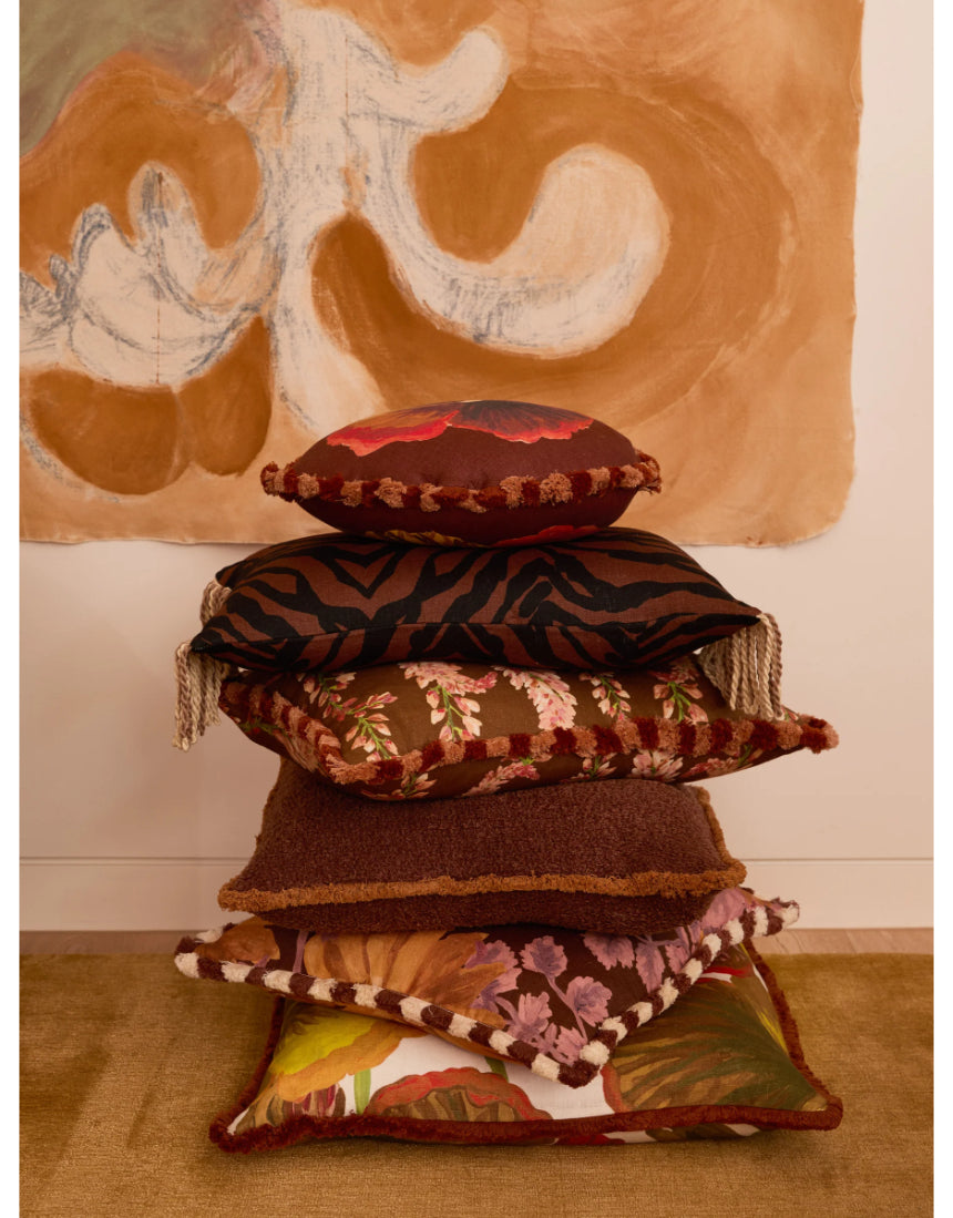 Bonnie and Neil Marigold Amber 50cm linen cushion with floral design, perfect for living room decor.