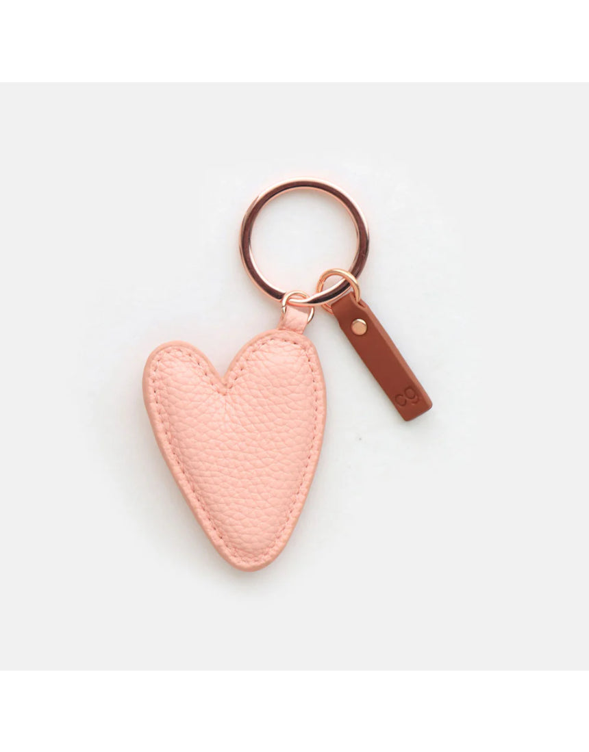 Heart-shaped peach key ring from Scarpa Imports with a colorful, glossy finish and metal keyring attachment.