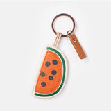 Watermelon-shaped key ring by Scarpa Imports featuring vibrant red and green colors with a realistic watermelon design.