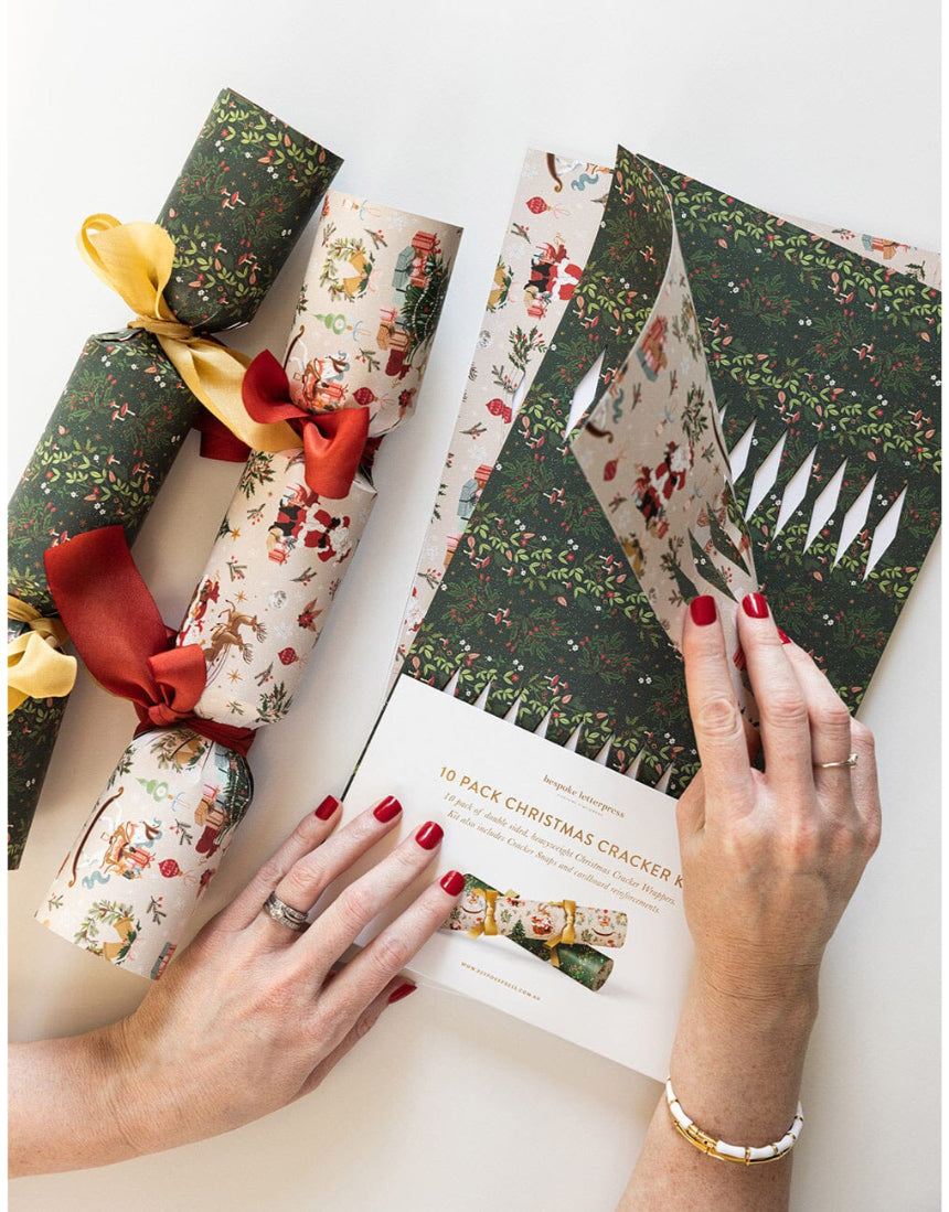 Bespoke Letterpress Christmas cracker kit featuring Jolly Santa design with festive decorations and packaging for holiday celebrations.