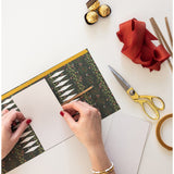 Bespoke Letterpress 10-pack Jolly Santa Christmas cracker kit with festive holiday decorations and detailed paper craftsmanship.