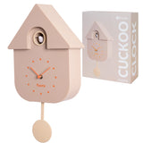 Beige Fisura cuckoo clock with traditional design and wooden details, showcasing the clock face and decorative elements.