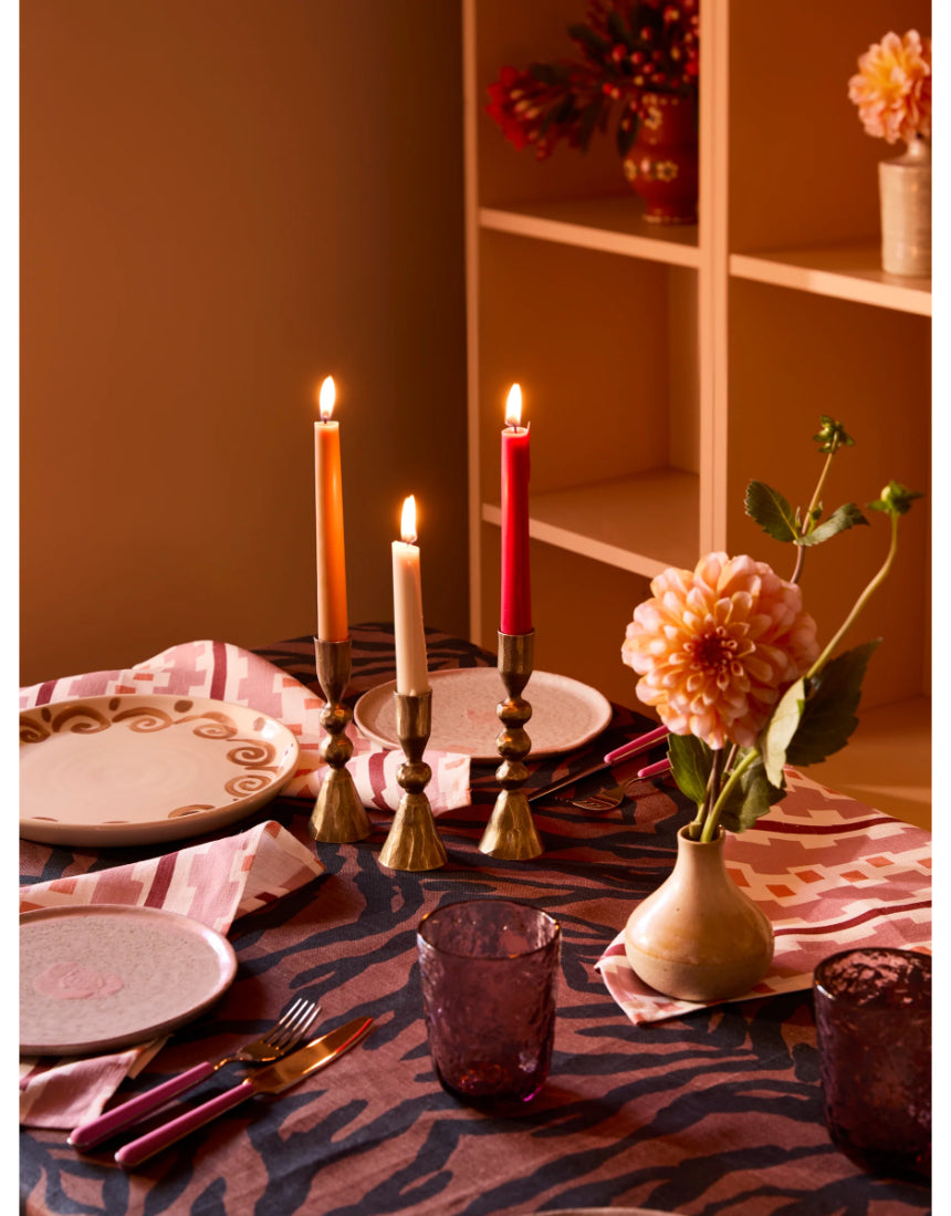 Set of three brass candle holders by Bonnie and Neil, decorative vintage-style holders with intricate design details.