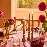 Set of three brass candle holders by Bonnie and Neil, stylish and modern with a sleek, contemporary design.