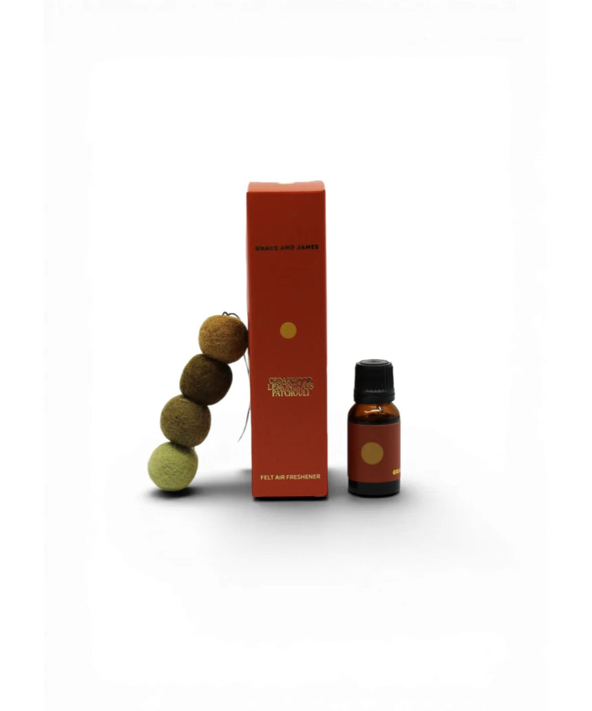 Grace & James Cedarwood, Lemongrass, and Patchouli air freshener bottle with natural scent blend.