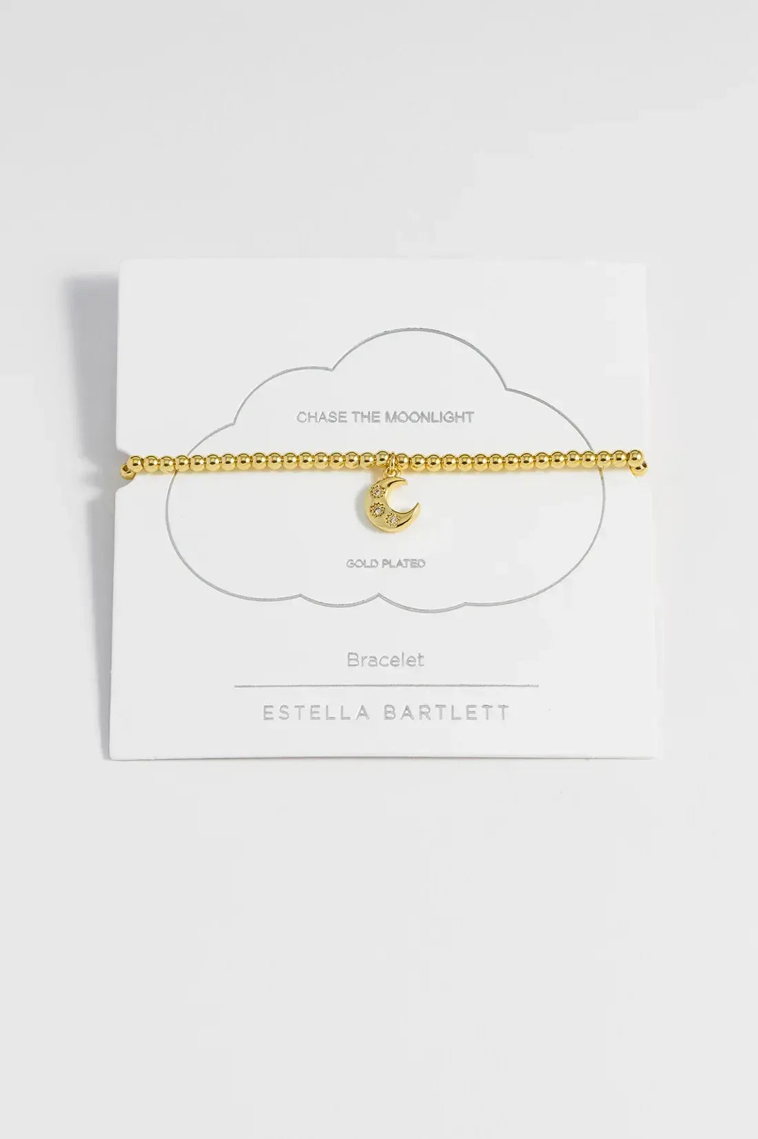Gold-plated Estella Bartlett CZ moon stretch bracelet featuring a delicate celestial design on a jewelry image.