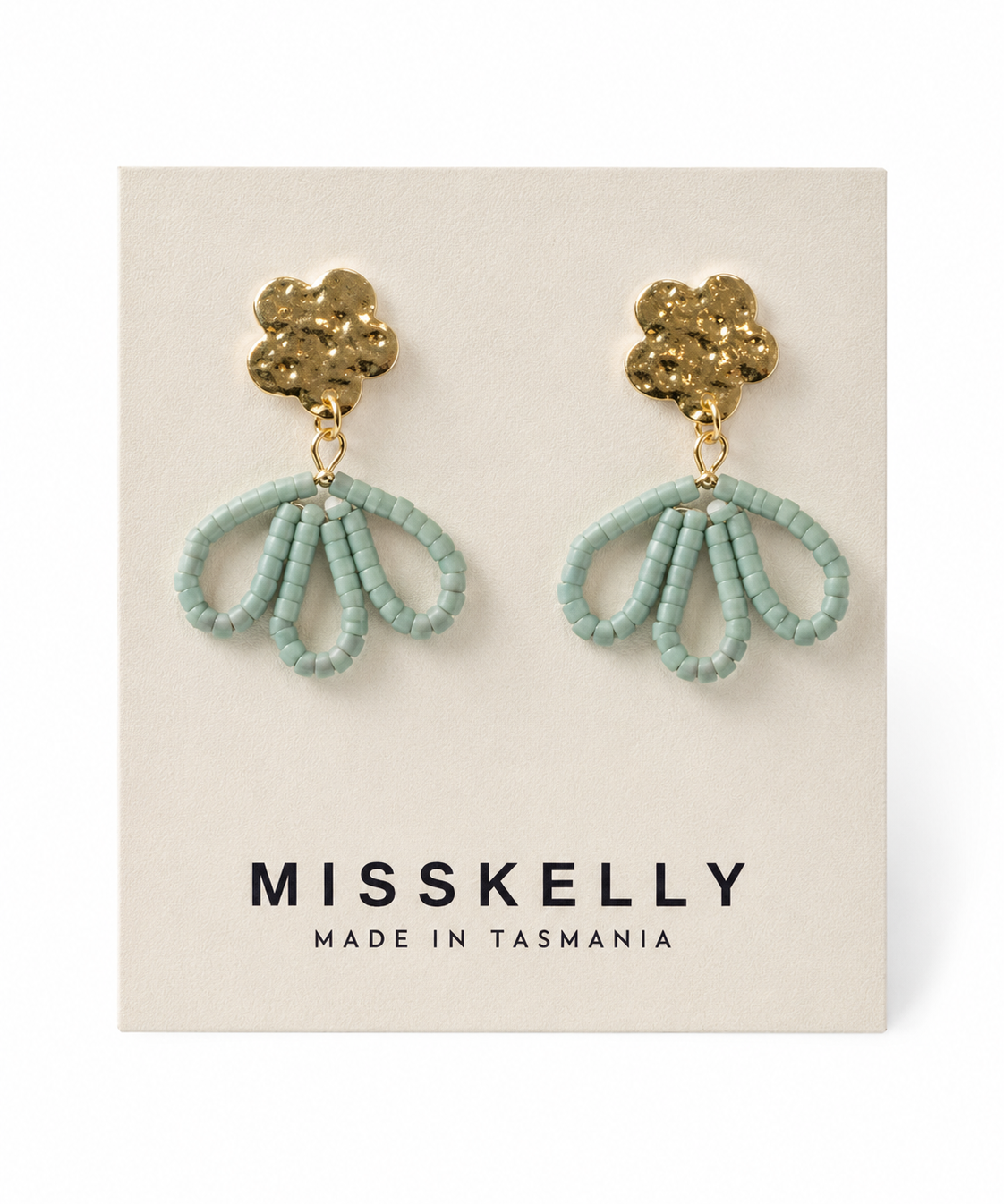 Gold floral top earrings by Miss Kelly featuring petal-shaped design and intricate detailing.