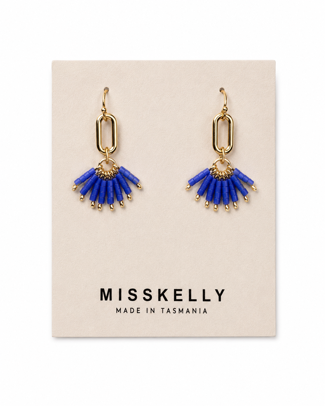 Gold Miss Kelly Fireworks Earring with intricate design and dangling elements, stylish jewelry for modern fashion.
