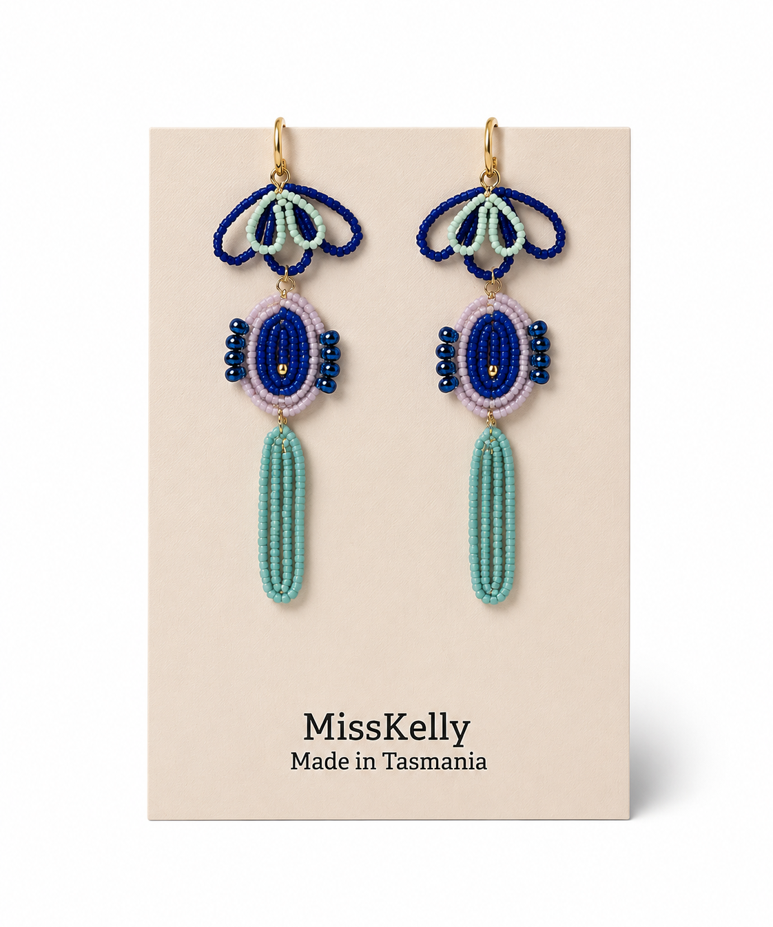 Miss Kelly Madison statement earrings featuring bold, stylish design with intricate detailing in gold-tone finish.