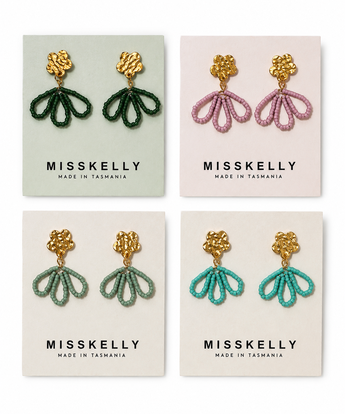 Gold floral earrings by Miss Kelly featuring petal-shaped design, elegant jewelry accessory for women.