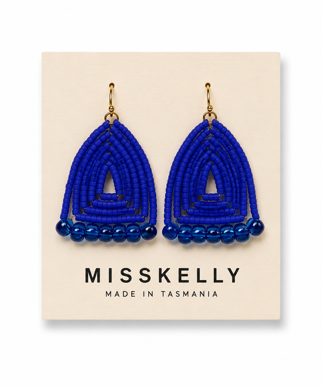 Miss Kelly Donna triangle earrings featuring sleek gold-tone metal and minimalist design, perfect for stylish accessories.
