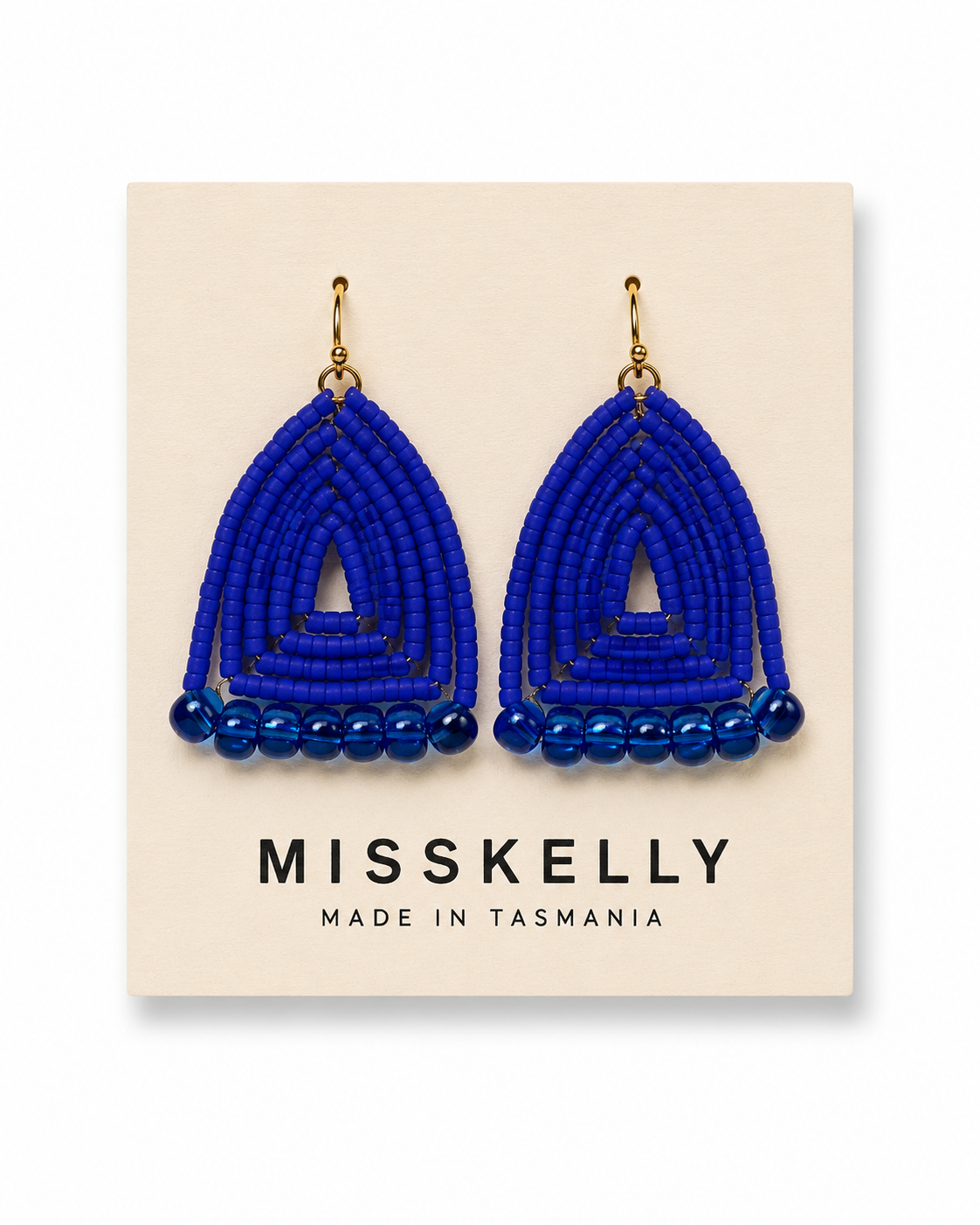Miss Kelly Donna triangle earrings featuring sleek gold-tone metal and minimalist design, perfect for stylish accessories.