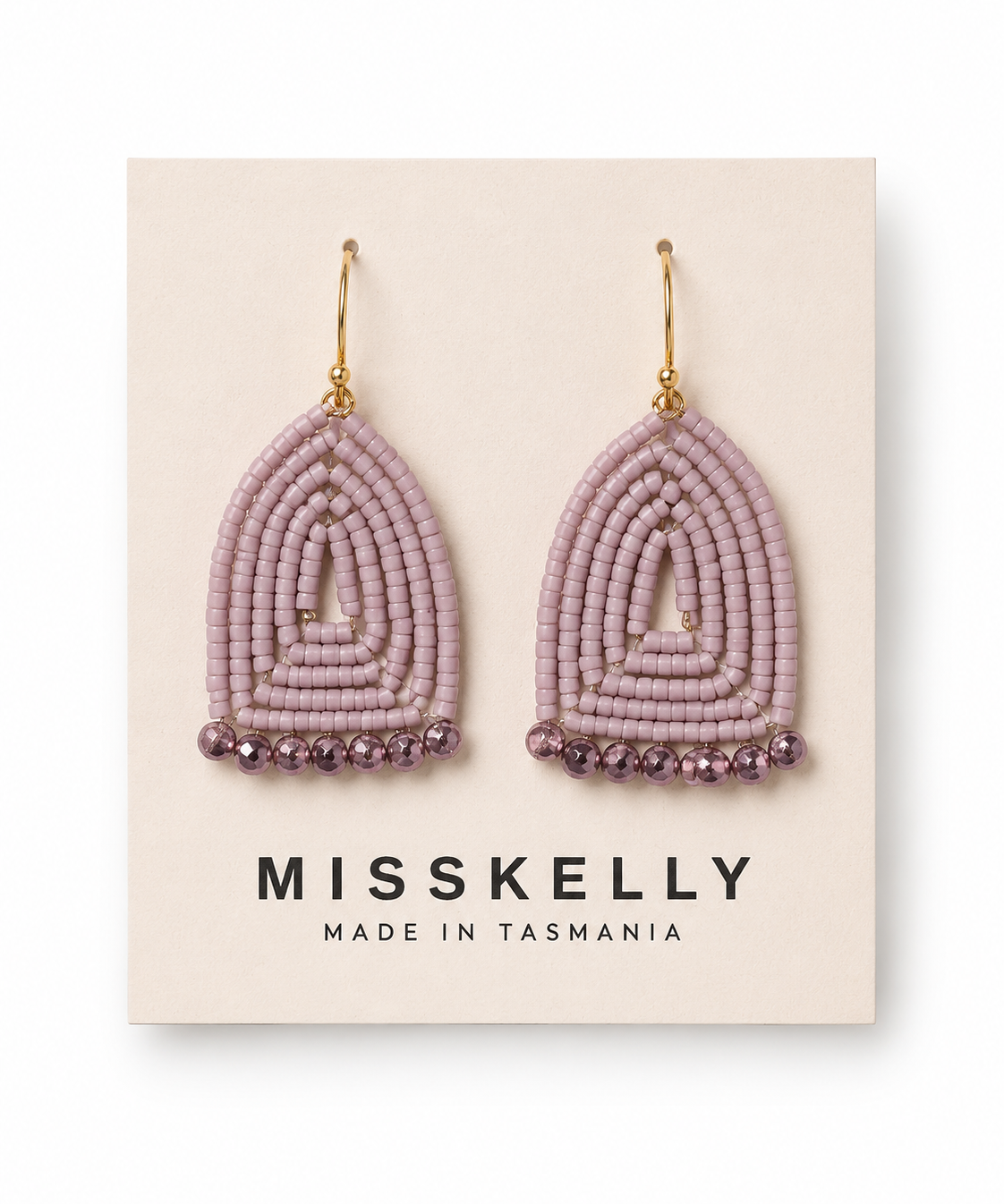 Miss Kelly Donna triangle earrings featuring gold-toned metal and geometric design, perfect for stylish accessorizing.