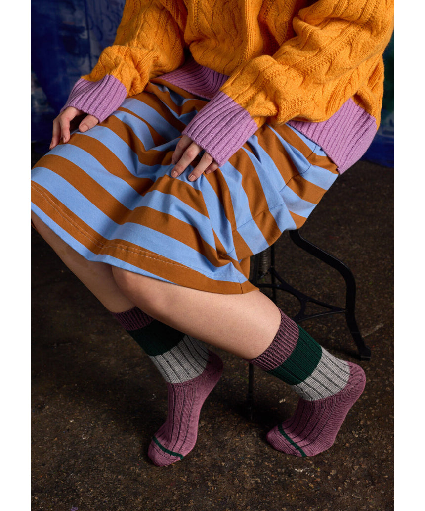 Close-up of Tightology chunky rib Merino wool socks in mauve, showing thick knit texture and cozy design.