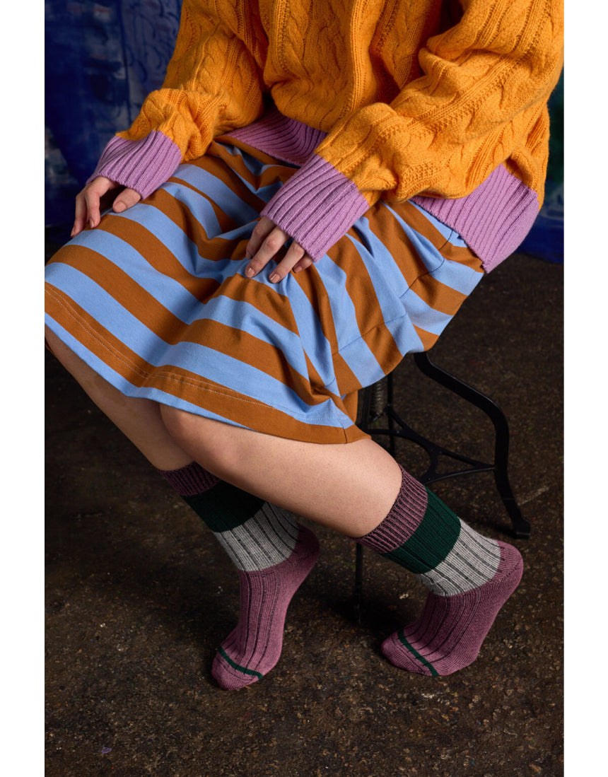 Close-up of Tightology chunky rib Merino wool socks in mauve, showing thick knit texture and cozy design.