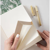 Bespoke Letterpress Jardin Notepad Jotter with tropical floral cover, showcasing elegant stationery design and craftsmanship.