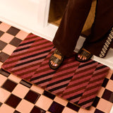Bonnie and Neil patchwork pink door mat with colorful geometric pattern for welcoming entryway decor.