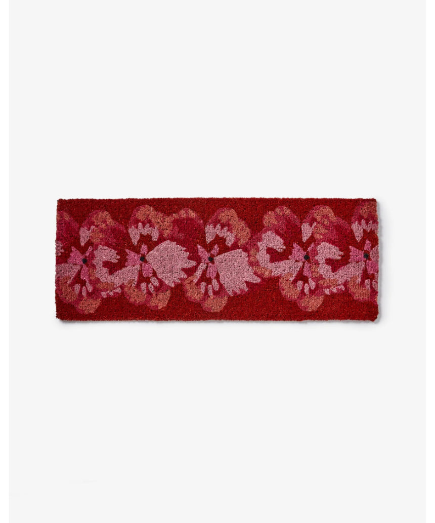 Bonnie and Neil Pansy Pink Long Door Mat with floral pattern made of coir, suitable for indoor or outdoor use.