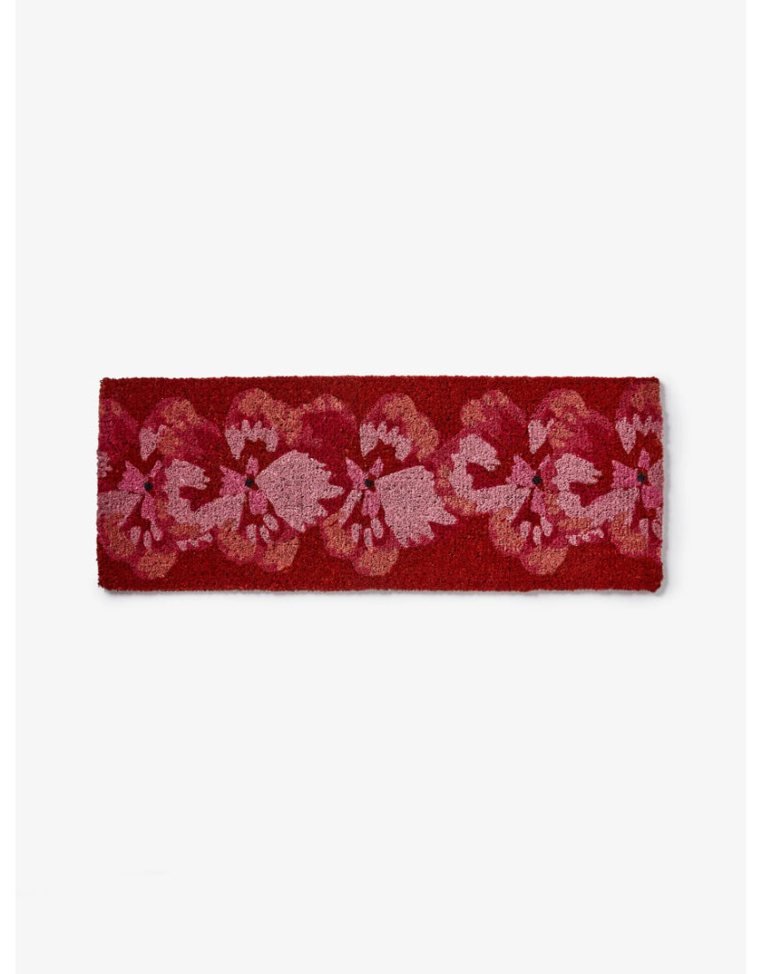 Bonnie and Neil Pansy Pink Long Door Mat with floral pattern made of coir, suitable for indoor or outdoor use.