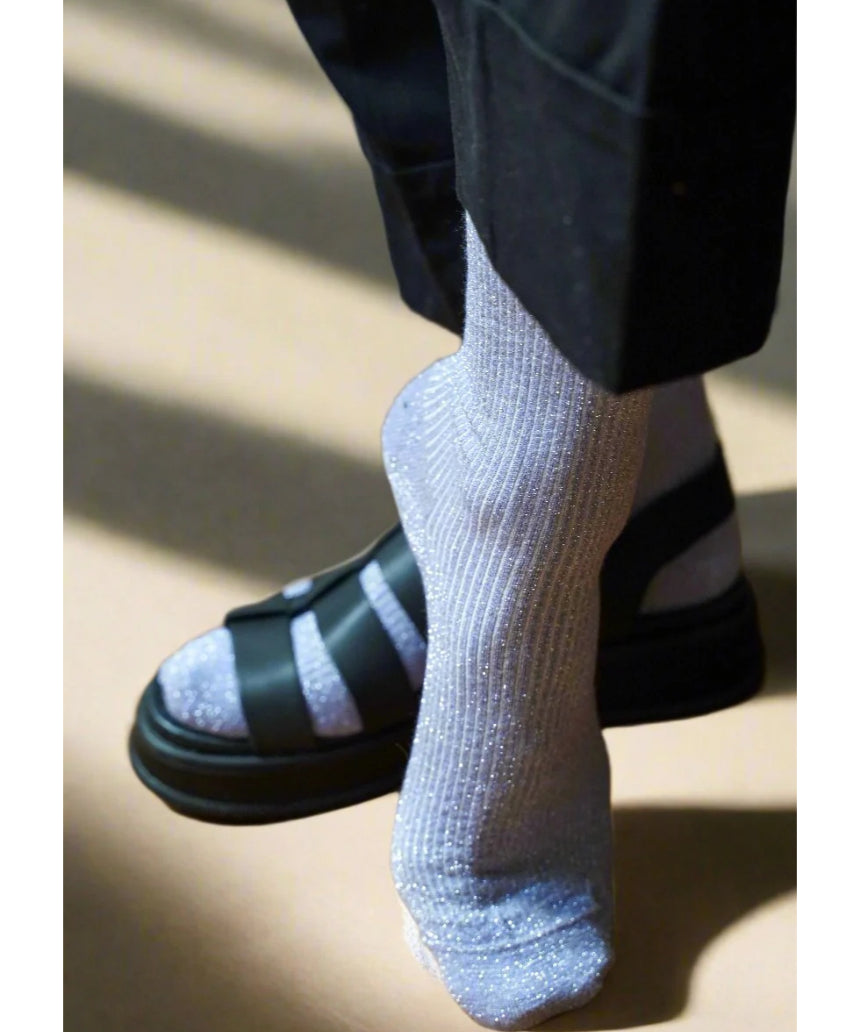 Klue glitter lurex socks in lilac color, featuring shiny, sparkly fabric with a comfortable sock design.
