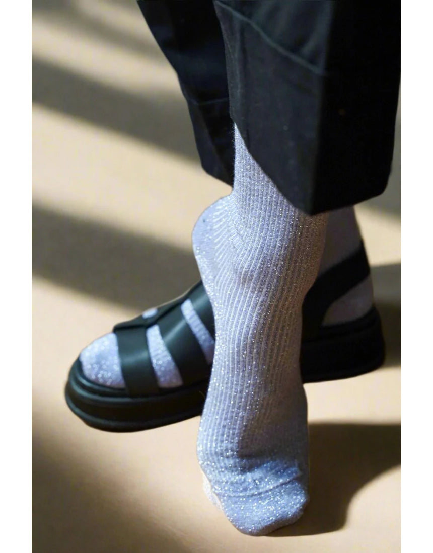 Klue glitter lurex socks in lilac color, featuring shiny, sparkly fabric with a comfortable sock design.