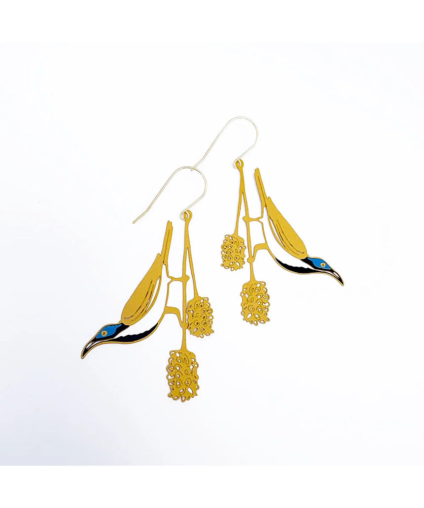Denz Blue Faced Honeyeater earrings with honey, blue, and black feathers and metal hooks, showcasing vibrant, nature-inspired jewelry.