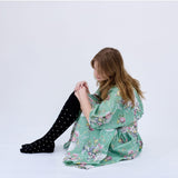 Black Dotty Merino Wool Socks by Tightology featuring colorful dotted pattern and soft, warm knit fabric.