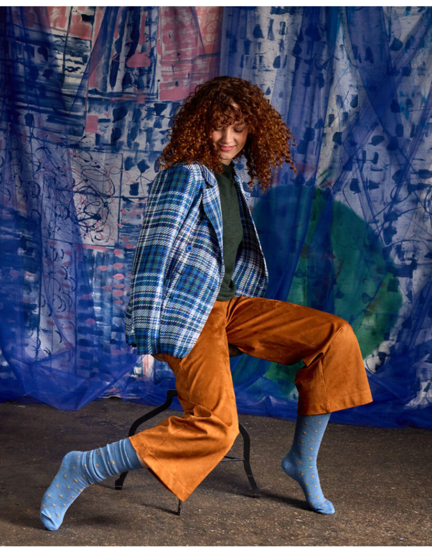 Blue Dotty Merino Wool Socks by Tightology featuring a colorful dotted pattern and comfortable knit design.